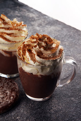 Hot chocolate cocoa with whipped cream for xmas on table