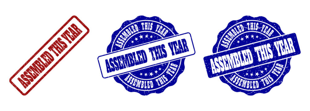 ASSEMBLED THIS YEAR grunge stamp seals in red and blue colors. Vector ASSEMBLED THIS YEAR watermarks with grunge surface. Graphic elements are rounded rectangles, rosettes, circles and text labels.
