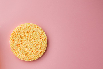 cleansing oil for the face or cleansing gel with oils. skin cleaning, makeup removal, facial cleanser, washing, pink background. selective focus.