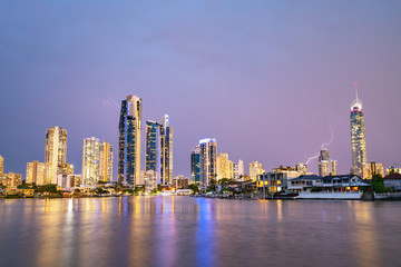 The Gold Coast Arts Centre with a view of Surfers Paradise at sunset with amazing sky and reflections