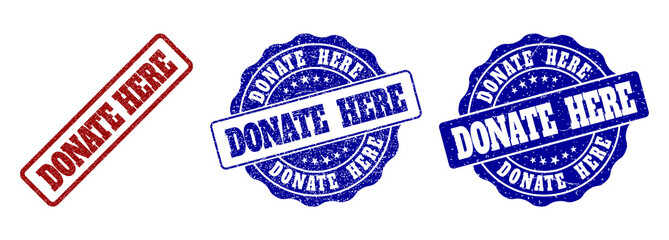 DONATE HERE grunge stamp seals in red and blue colors. Vector DONATE HERE signs with grunge surface. Graphic elements are rounded rectangles, rosettes, circles and text titles.