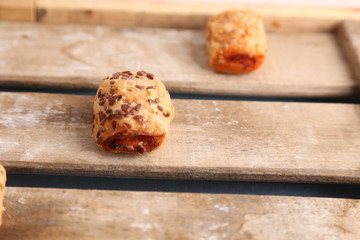 delicious salty cake on wooden background