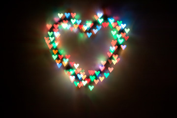 heart of bright colored hearts-bokeh.Background for lovers.