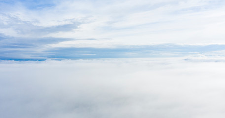 Obraz premium Aerial view of some beautiful clouds and a blue sky.
