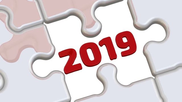 New 2020 year. Folded white puzzles elements and one red with number of year 2020 falls into its place with the number of the year 2019. Footage video