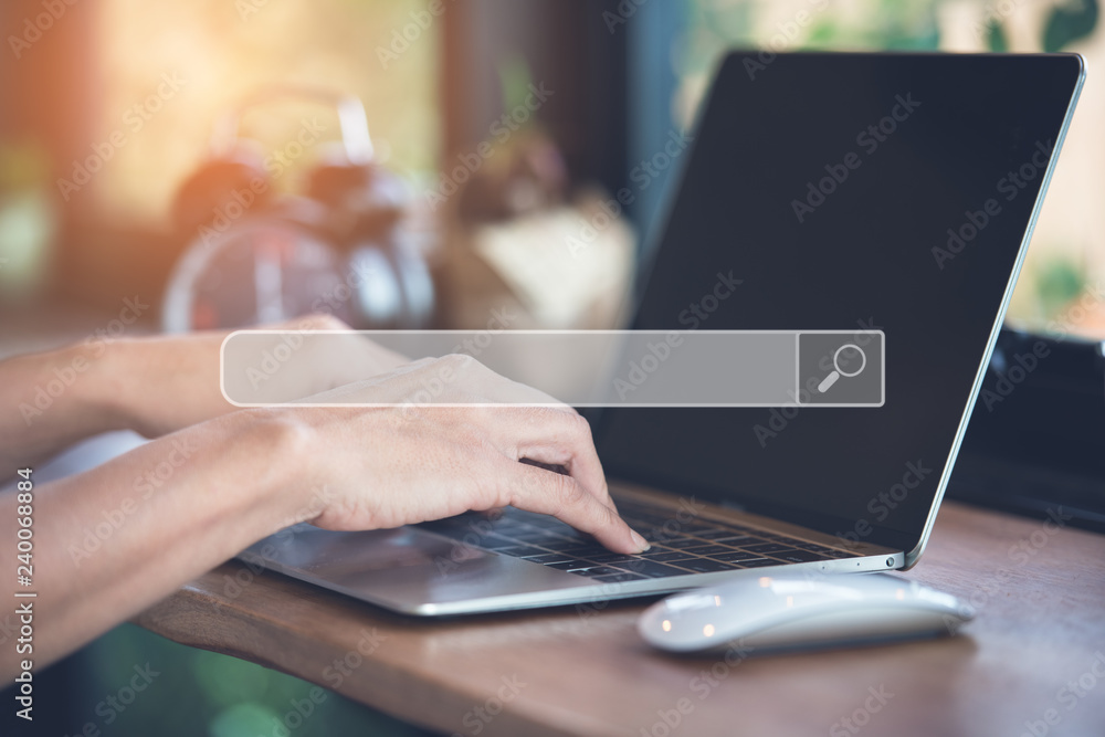 Fototapete Hand man using labtop for Searching Browsing Internet Data Information Networking Concept.