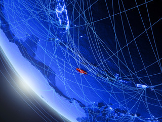 Jamaica on blue digital planet Earth from space with network. Concept of international communication, technology and travel.