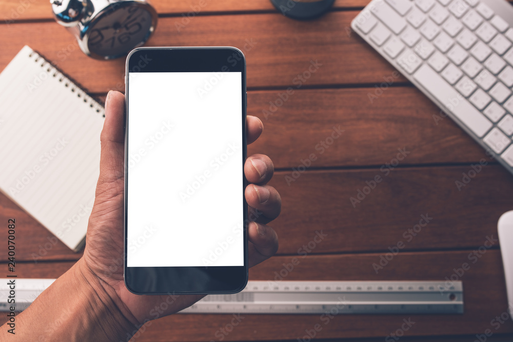 Poster hand use smart phone with blank empty screen top view