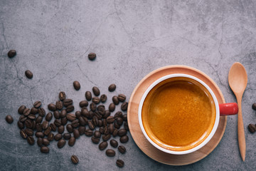Obraz na płótnie Canvas Top view of espresso coffee., on gray background with copy space.coffee beans.