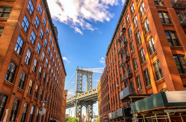 Manhattan Bridge between the buildings in Brooklyn