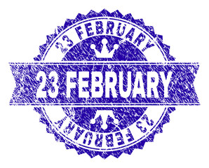 23 FEBRUARY rosette stamp seal imprint with distress texture. Designed with round rosette, ribbon and small crowns. Blue vector rubber watermark of 23 FEBRUARY caption with dirty texture.
