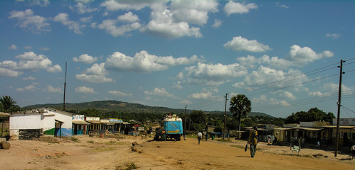 Near Chengi, Zambia, 11th June 2005: People walking by the road during a bus pitstop