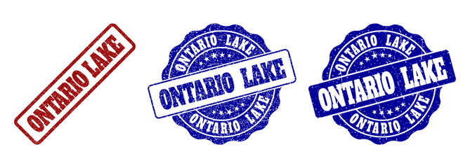 ONTARIO LAKE scratched stamp seals in red and blue colors. Vector ONTARIO LAKE labels with grainy effect. Graphic elements are rounded rectangles, rosettes, circles and text labels.