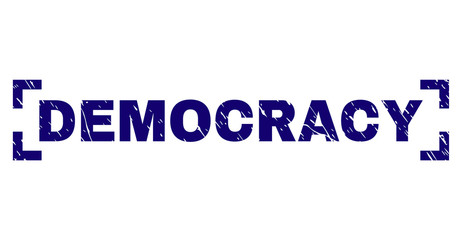 DEMOCRACY label seal print with distress texture. Text label is placed between corners. Blue vector rubber print of DEMOCRACY with grunge texture.