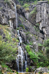 Hang Mua Mountain viewpoint or Mua Caves Ecolodge, Stunning view of Tam Coc area with mountain range, rice fields and waterway.