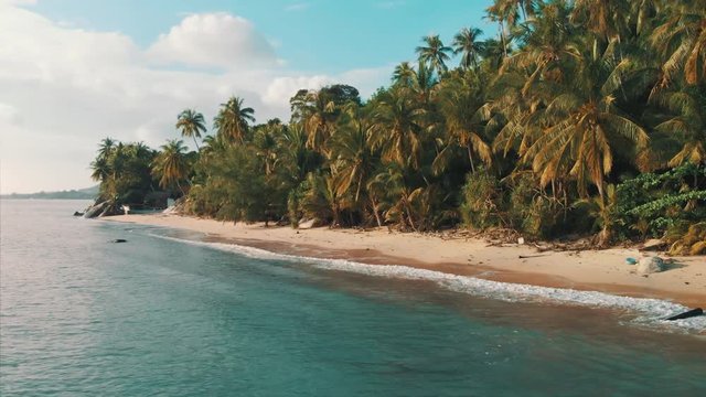 Aerial pano view of tropical beach during sunset