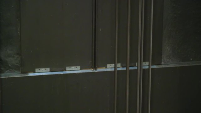 Elevator Shaft Interior: Thick elevator cables pull up a lift car inside shaft