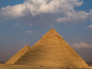 Fototapeta na wymiar View of the great pyramids at sunset