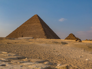 Great Pyramids of Egypt in the late afternoon sun, blue sky