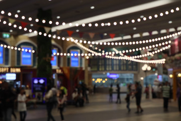 Fototapeta premium Night city street lights bokeh background.