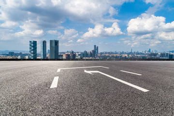 Panoramic skyline and modern business office buildings with empty road,empty concrete square floor