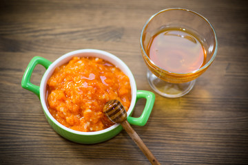Boiled sweet pumpkin porridge with rice in a plate