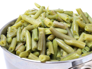 Green peas in bowl on white background