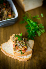 eggplant caviar with tomatoes and a slice of bread