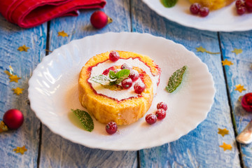 Cake with red berries on festive background