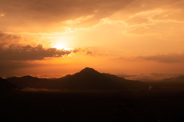 Beautiful sunrise with cloud and mountain in morning.