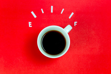 coffee is a fuel concept - a cup on a red background