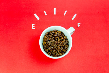 coffee is a fuel concept - a cup on a red background