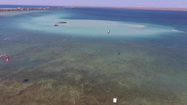 Kite surfing on Donuzlav lake. Mirny. Crimea. August 2018. Aerial drone view.