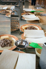 Plakat Dough, fried chopped meat and utensils for cooking classes on wooden table, concept of cooking class