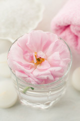 Romantic composition with candles and flowers. The concept of Spa, cosmetic, procedure, treatment. aroma theme