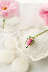 Romantic composition with candles and flowers. The concept of Spa, cosmetic, procedure, treatment. aroma theme