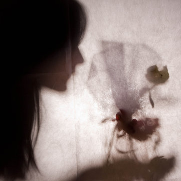 Autoportrait behind curtain