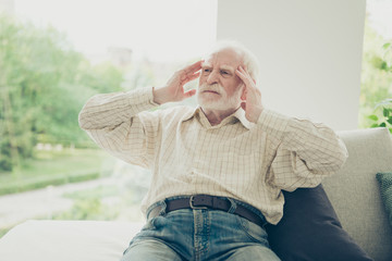 Close up portrait of grey haired he his him grandpa with spasm s
