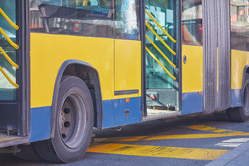 Public transportation / bus in urban surroundings on a station.