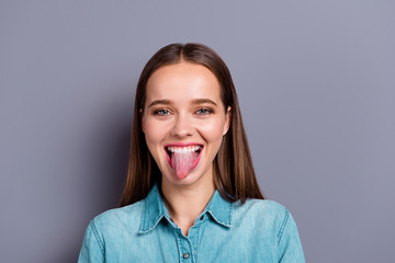 Close up portrait of crazy people smiling showing tongue she her © deagreez