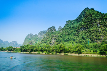 Mountains and river scenery with blue sky