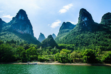 Mountains and river scenery with blue sky