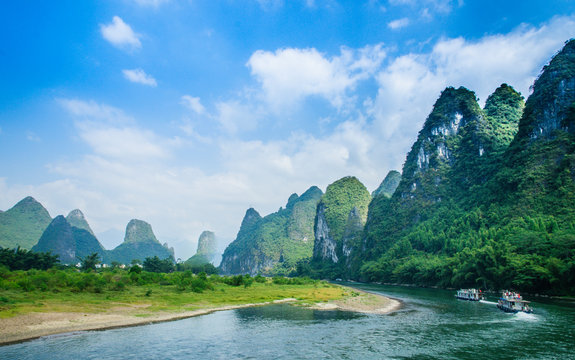Mountains and river scenery with blue sky 