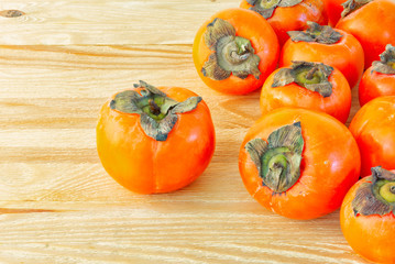 Persimmon fruits are ripe and appetizing