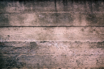 Concrete construction wall with striped texture background