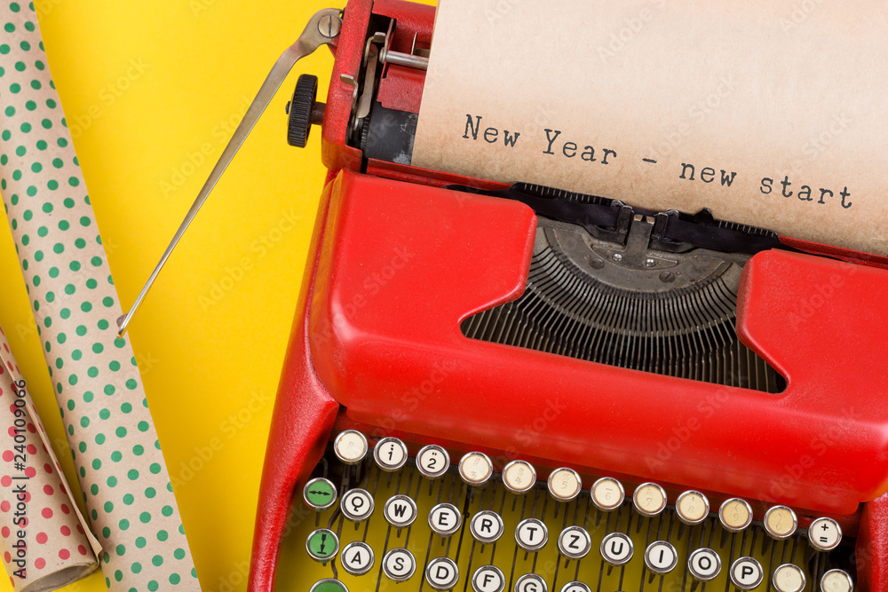 Fototapete red typewriter with text 