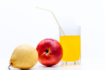 different fruit and juice or smoothie in a glass