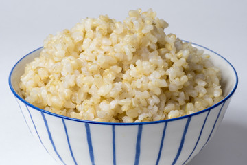 Cooked brown rice in a Japanese style bowl