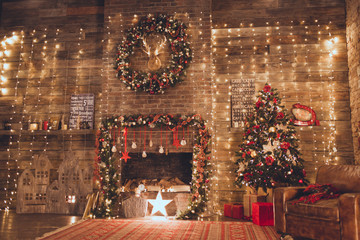 Christmas living room with fire place and garland lights