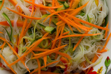 Funchoza salad with carrot, cucumber and pepper